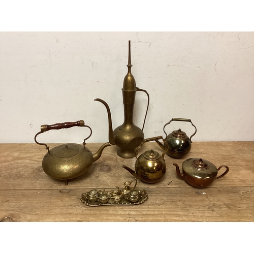 148 - Collection of Brass Tea & Coffee Pots