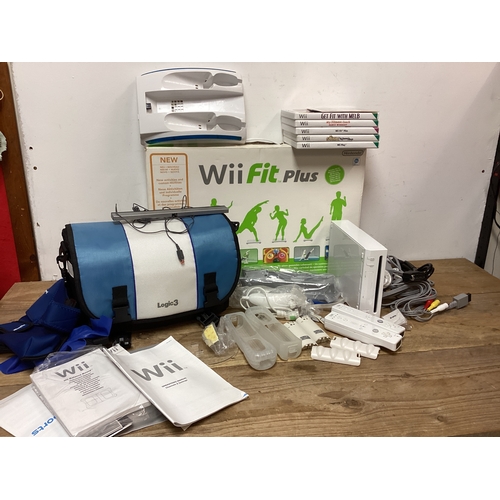 266 - Nintendo Wii complete with Games, Carry Bag, Controllers, Wii Fit Plus Board, instructions, 8mb card... 