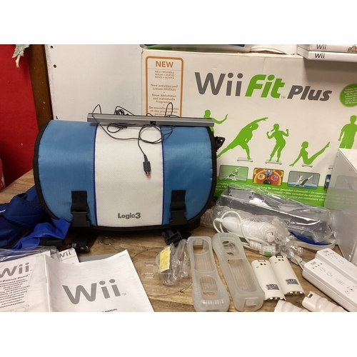 266 - Nintendo Wii complete with Games, Carry Bag, Controllers, Wii Fit Plus Board, instructions, 8mb card... 