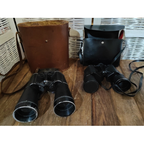 108 - 2X Binoculars 10 X 50 Boots Pacer and 12 X 60 Meopta Both Include Carry Cases