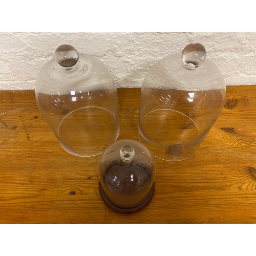 77 - Trio of Glass Display Domes, diameters 12.5cm & 20cm