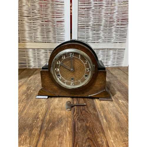472 - Wooden cased mantle clock with Westminster chime including key