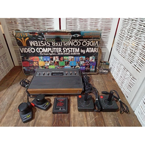 302 - Original Atari Video Computer System c/w paddles, joysticks & Combat Game. No Power Supply