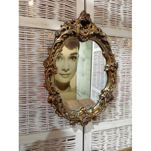 58 - Plaster Framed Ornate Oval Gilt Mirror. App 20