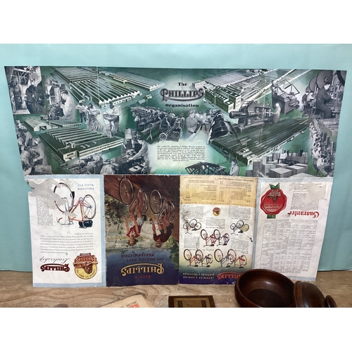 54 - An Eclectic Mix to include Treen Items, Corkscrews etc., a vintage Phillips Bicycle Poster & The Dai... 