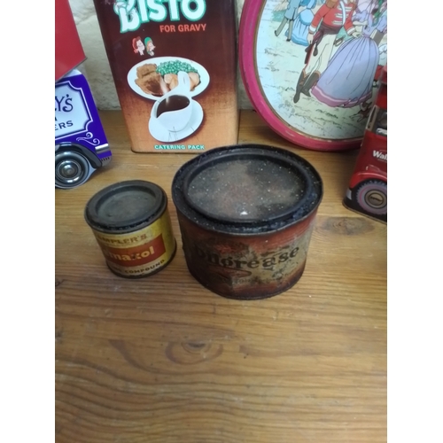 57 - Mixed lot of vintage tins to include quality street, temple's  temaxol, mobilgrease, and more