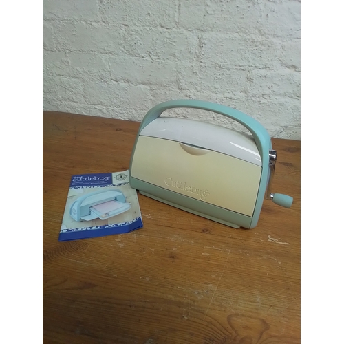 Cuttlebug embosser and die cutter. Comes with instructions but not boxed.