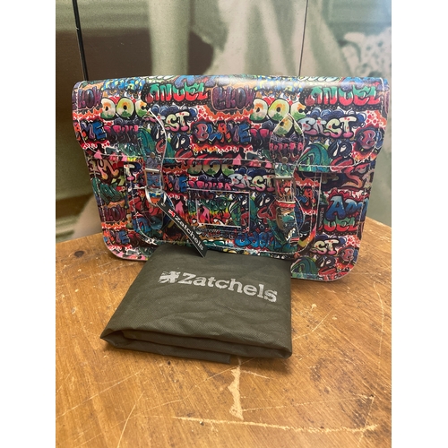 436 - Zatchels designer leather bag. Satchel bag graffiti design. Complete with label and dust bag. Height... 