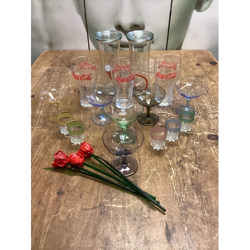 255 - Collection of Glasses to include Champagne, Shot & Coca Cola Glasses with a bunch of Glass Red Roses