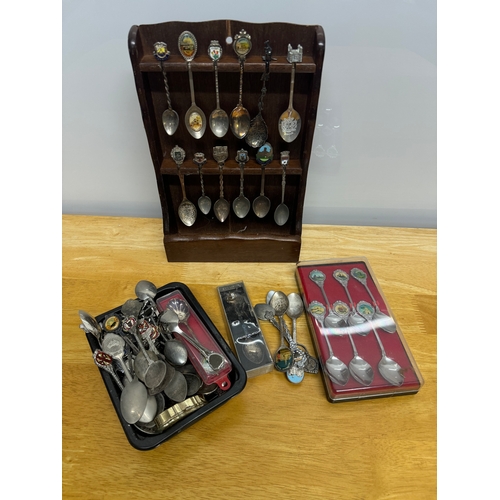 60 - *Large collection of decorative spoons and displays