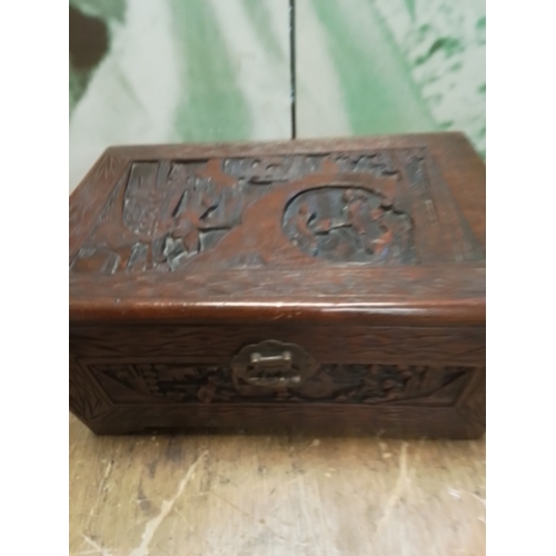 224 - A beautiful hand carved wooden box with lock and pin.