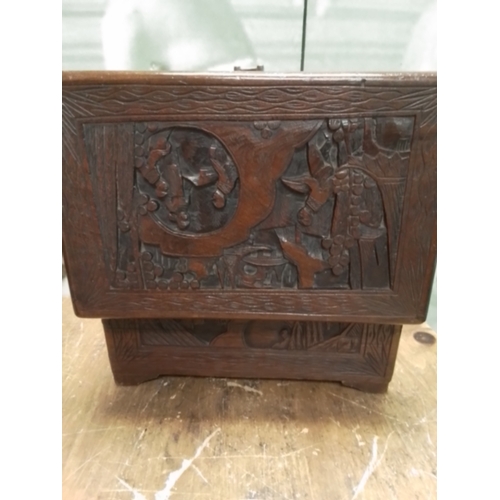 224 - A beautiful hand carved wooden box with lock and pin.