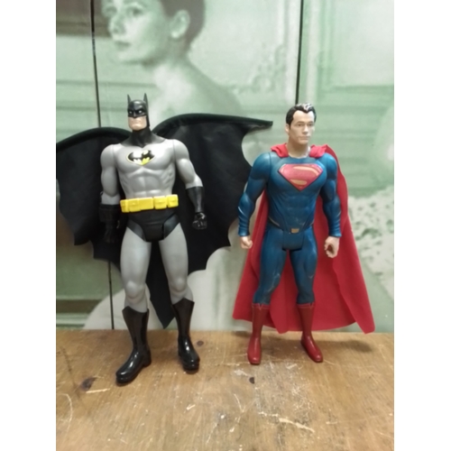 291 - Large taking Bat man and Superman figurines