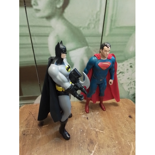 291 - Large taking Bat man and Superman figurines