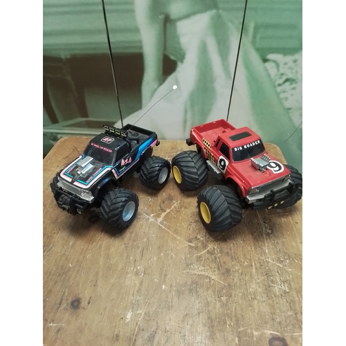 298 - 2 remote control cars 4x4's without remotes.