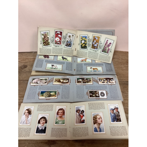 41 - Wills Imperial Tobacco Company Cigarette Cards & Albums, Flowers, Celebrities, Sea Shore, Dogs, Film... 