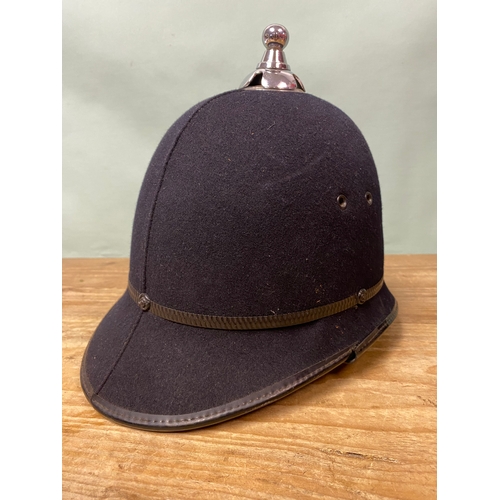 558 - C.1960’s British Police Helmet
