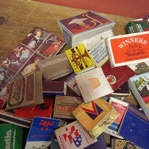24 - Large collection of vintage match boxes with matches.