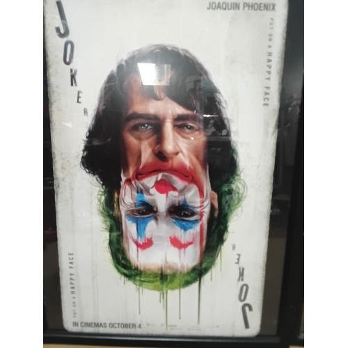 7 - Framed Batman and Joker pictures.