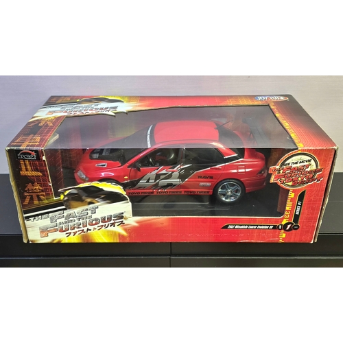853 - Joyride 1:18 Fast & Furious Tokyo Drift 2002 Mitsubishi Lancer Evo VII in Red