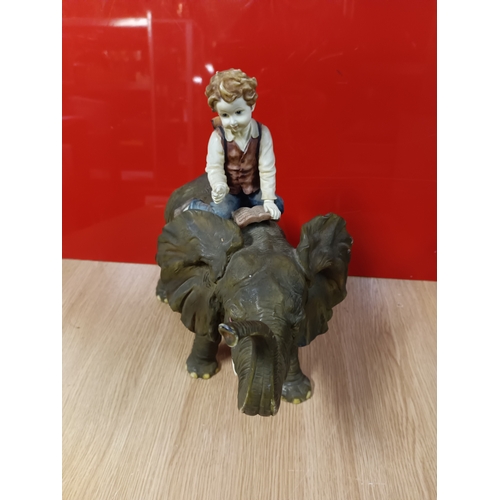 52 - Figure of a boy on an elephant