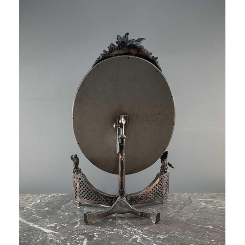 1231 - A 20th century dressing table mirror having carved decoration featuring birds and latticework.Qty: (... 