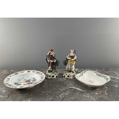 1238 - A collection of English porcelain comprising two Derby figures one numbered to base, a Worcester cha... 