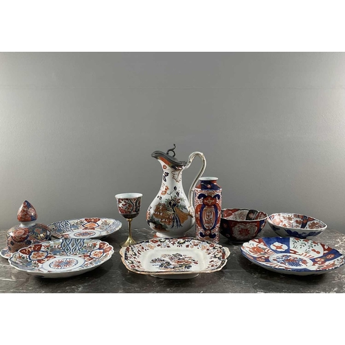 1242 - A collection of Imari pattern ceramics of varying age and origin, largest 28cm.Qty: (10)Some chippin... 