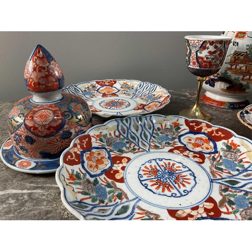 1242 - A collection of Imari pattern ceramics of varying age and origin, largest 28cm.Qty: (10)Some chippin... 