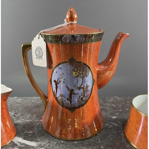 1245 - A Carltonware tea set comprising nine peices, having orange ground with sky blue motifs and lustre g... 