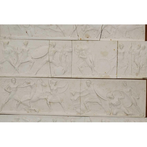 1255 - A collection of white plaster relief panels, late 19th or early 20th century, relief decorated with ... 