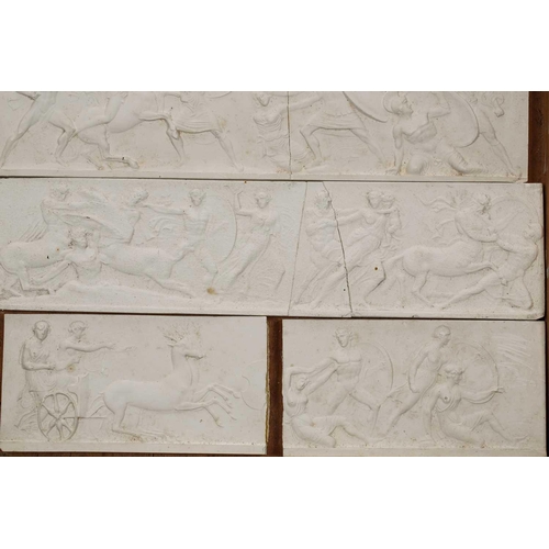 1255 - A collection of white plaster relief panels, late 19th or early 20th century, relief decorated with ... 