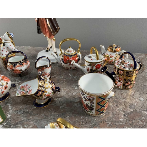 1262 - A collection of Royal Crown Derby ceramic minatures, all signed to bases, together with a Coalport '... 