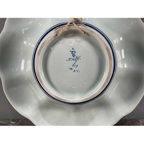 1265 - A Delft bowl, 20th century, having blue and white decoration, signed to reverse, 35cm.Qty: (1)In goo... 