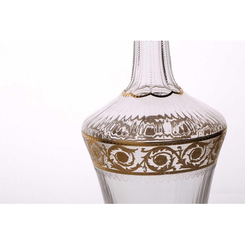 1271 - A 1961 St Louis Thistle pattern crystal decanter and stopper, with gilt decoration on a circular foo... 