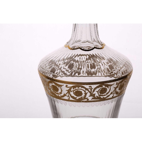 1271 - A 1961 St Louis Thistle pattern crystal decanter and stopper, with gilt decoration on a circular foo... 