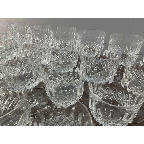 1274 - A set of cut glass comprising twenty eight pieces, signed to bases, 13cm.Qty: (28)Generally good con... 