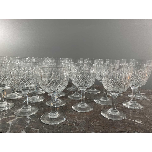 1274 - A set of cut glass comprising twenty eight pieces, signed to bases, 13cm.Qty: (28)Generally good con... 