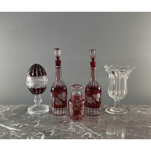 1276 - A collection of five pieces of glass comprising a pair of decanters, an egg shaped jar, a vase and a... 