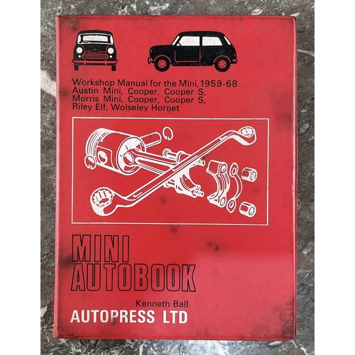 1295 - A collection of vintage car manuals and badges comprising the Mini Handbook, Ford Consul Zephyr Six ... 