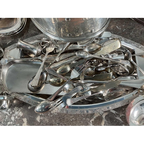 1325 - A large collection of silver plated items including a quantity of cutlery.Varied condition with some... 