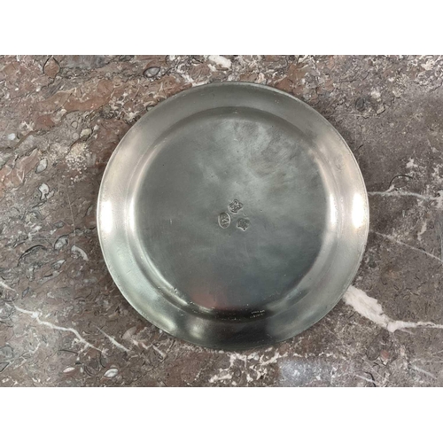 1231 - La Bottega Del Peltro; a large collection of Italian pewter tableware of varying sizes, the smallest... 