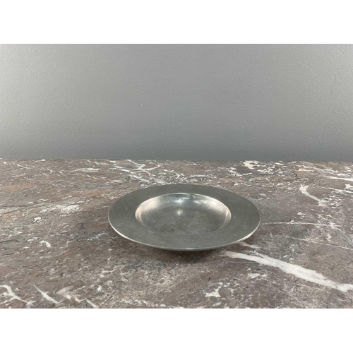 1231 - La Bottega Del Peltro; a large collection of Italian pewter tableware of varying sizes, the smallest... 