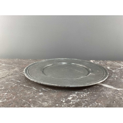 1231 - La Bottega Del Peltro; a large collection of Italian pewter tableware of varying sizes, the smallest... 