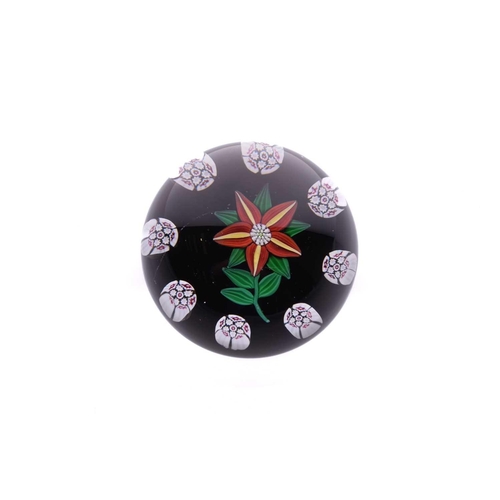 4 - Paul Ysart (?), (1904-1991), a red and yellow flower paperweight surrounded by intricate canes, unsi... 