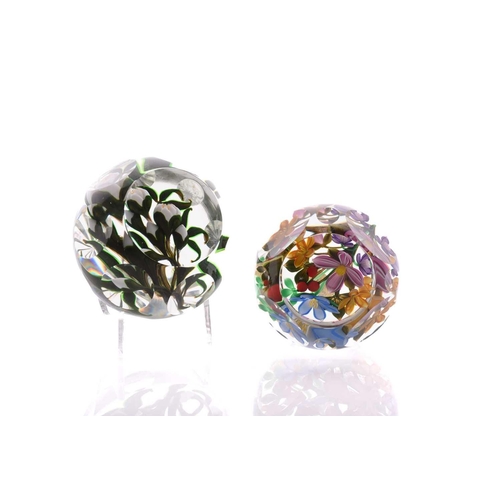 47 - Perthshire Paperweights; two faceted flower pattern paperweights, one having a white lampwork bouque... 