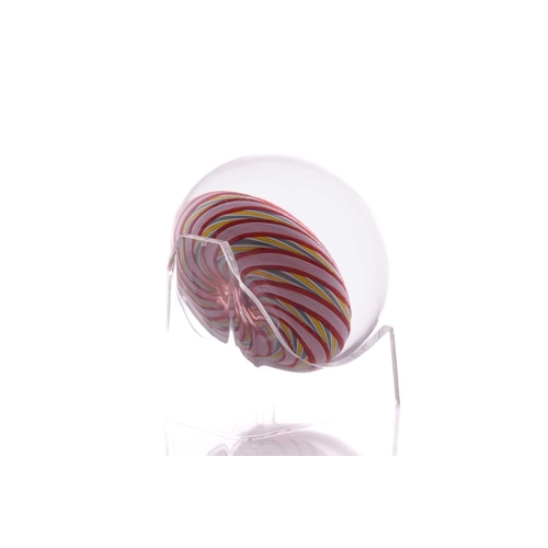 57 - Peter McDougall; two paperweights one having large central flower design with swirling ground and po... 