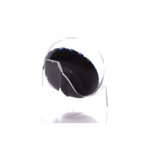 57 - Peter McDougall; two paperweights one having large central flower design with swirling ground and po... 