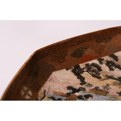 1236 - A Japanese Satsuma pottery octagonal dish painted in colours with many Geisha and children in a spri... 