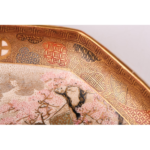 1236 - A Japanese Satsuma pottery octagonal dish painted in colours with many Geisha and children in a spri... 